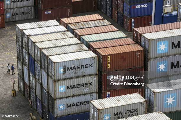 Containers sit stacked in a yard at Krishnapatnam Port in Krishnapatnam, Andhra Pradesh, India, on Saturday, Aug. 12, 2017. Growth in gross domestic...