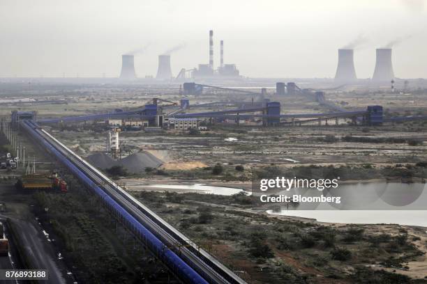 Conveyor runs through Krishnapatnam Port in Krishnapatnam, Andhra Pradesh, India, on Saturday, Aug. 12, 2017. Growth in gross domestic product...