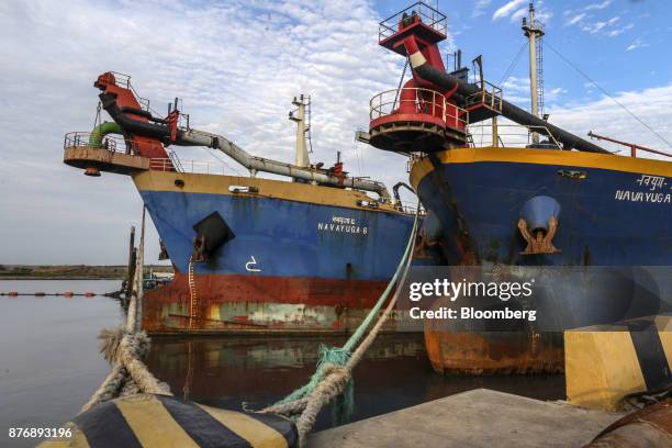 The Navayuga 6, left, and the Navayuga 2 dredgers sit docked at Krishnapatnam Port in Krishnapatnam, Andhra Pradesh, India, on Saturday, Aug. 12,...