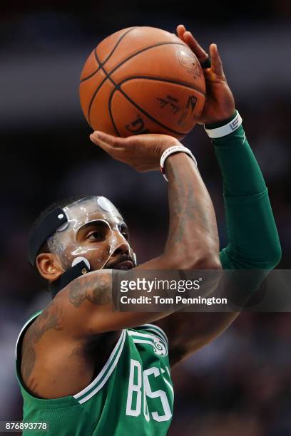 Kyrie Irving of the Boston Celtics shoots a free throw against the Dallas Mavericks at American Airlines Center on November 20, 2017 in Dallas,...