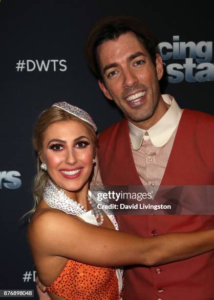 Personality Drew Scott and dancer Emma Slater pose at "Dancing with the Stars" season 25 at CBS Televison City on November 20, 2017 in Los Angeles,...