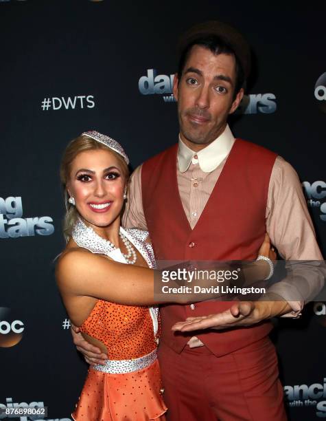 Personality Drew Scott and dancer Emma Slater pose at "Dancing with the Stars" season 25 at CBS Televison City on November 20, 2017 in Los Angeles,...