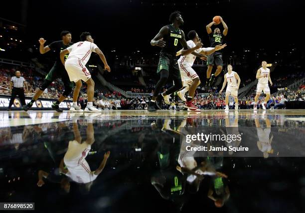 King McClure of the Baylor Bears shoots during the game National Collegiate Basketball Hall Of Fame Classic Semifinal game against the Wisconsin...