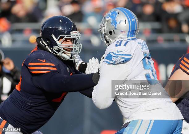 Kyle Long of the Chicago Bears blocks Akeem Spence of the Detroit Lions at Soldier Field on November 19, 2017 in Chicago, Illinois. The Lions...