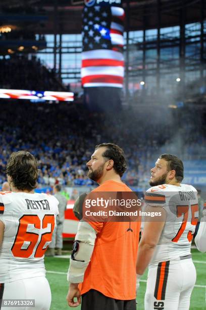 Center Austin Reiter, left tackle Joe Thomas, and left guard Joel Bitonio of the Cleveland Browns stands for the National Anthem prior to a game on...