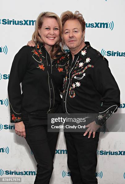 Julie Reiten and musician Brian Setzer visit the SiriusXM Studios on