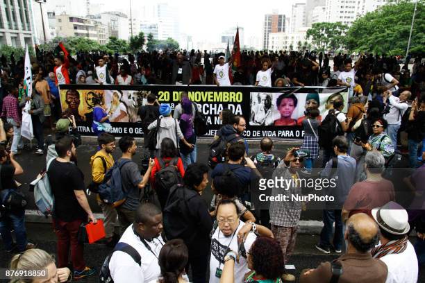 People participate in the 14th March of Consciência Negra, on Avenida Paulista, in Sao Paulo, Brazil, on the afternoon of 20 November 2017. The day...