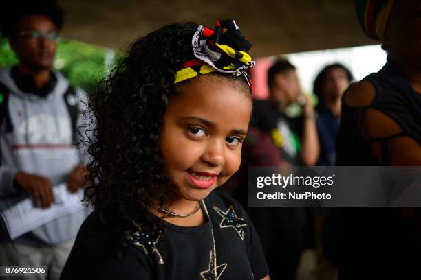 With slogans, banners and posters against prejudice Black, People take part at the 14th March of Consciência Negra, on Avenida Paulista, in Sao...