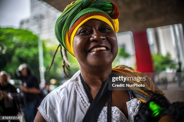 With slogans, banners and posters against prejudice Black, People take part at the 14th March of Consciência Negra, on Avenida Paulista, in Sao...