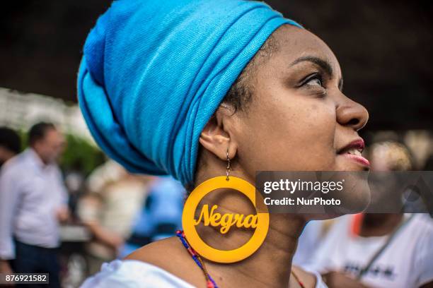 With slogans, banners and posters against prejudice Black, People take part at the 14th March of Consciência Negra, on Avenida Paulista, in Sao...
