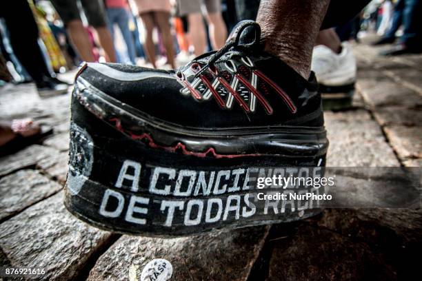 With slogans, banners and posters against prejudice Black, People take part at the 14th March of Consciência Negra, on Avenida Paulista, in Sao...