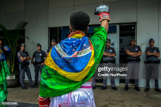 With slogans, banners and posters against prejudice Black, People take part at the 14th March of Consciência Negra, on Avenida Paulista, in Sao...