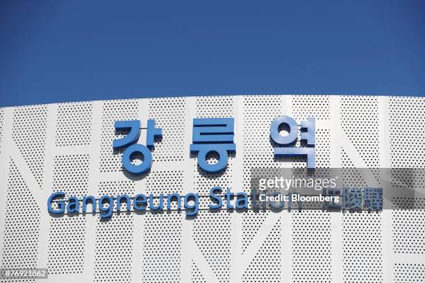 Signage is displayed at Gangneung Station as it stands near completion in Gangneung, Gangwon-do, South Korea, on Tuesday, Nov. 21, 2017. Visitors to...