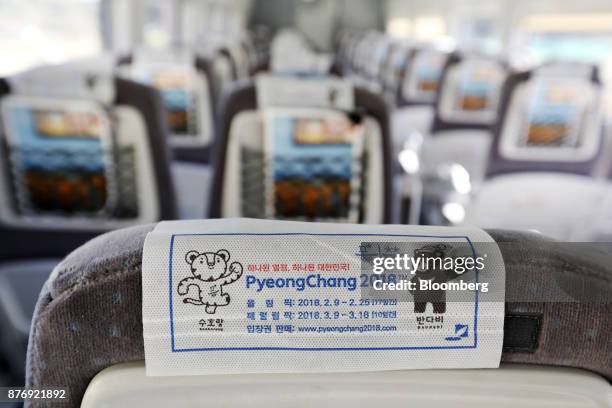 Advertising for the 2018 PyeongChang Winter Olympic Games is displayed on the headrest cover of a seat on a Korea Train Express Sancheon high-speed...