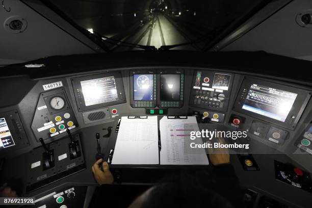 Driver operates a Korea Train Express Sancheon high-speed train, manufactured by Hyundai Rotem Co., during a media tour travelling to Gangneung,...