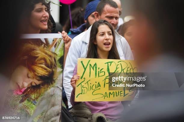 Group of people gathered for ask justice for the unsolved murder of a young man Samuel Chambers in the Plaza de la Independencia in Quito city,...