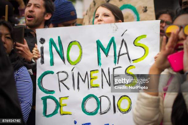 Group of people gathered for ask justice for the unsolved murder of a young man Samuel Chambers in the Plaza de la Independencia in Quito city,...