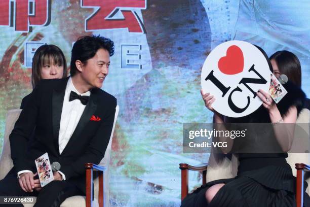 Japanese musician/actor Masaharu Fukuyama and Japanese actress Nanami Sakuraba attend the premiere of director John Woo's film 'Man Hunt' on November...