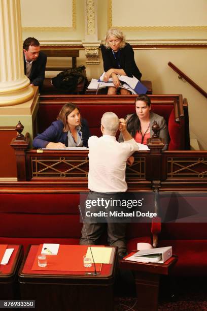 Gavin Jennings MP seeks advice on an answer from colleagues on November 21, 2017 in Melbourne, Australia. Victoria's lower house passed the historic...