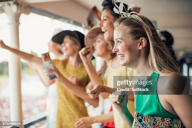 group of young women - woman fascinator stock pictures, royalty-free photos & images