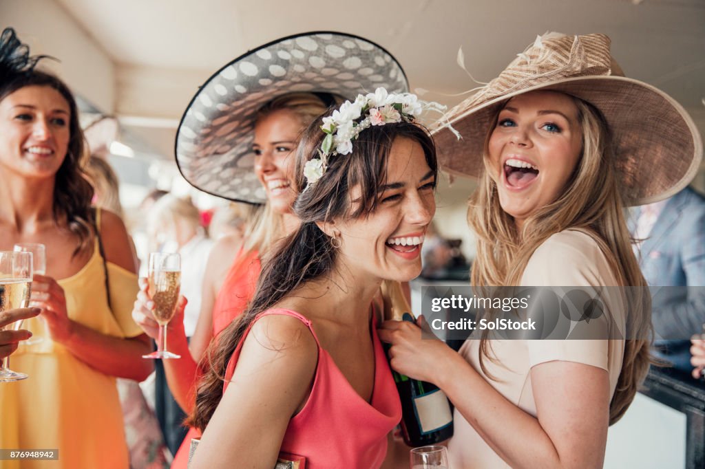 Pouring Champagne with Friends