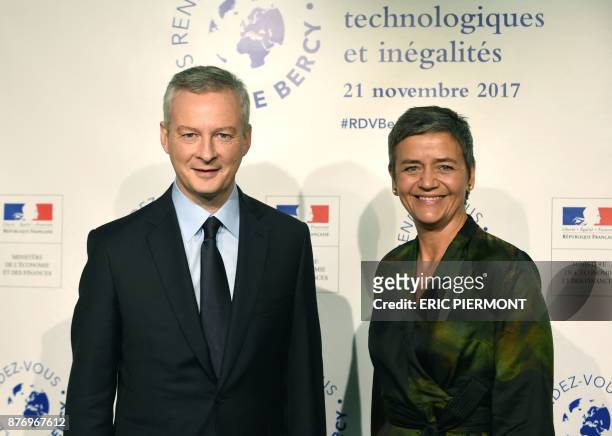 French Economy Minister Bruno Le Maire greets European Commissioner for competition Margrethe Vestager prior to attend a meeting on "Technology...