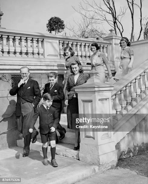 Joseph P Kennedy, US Ambassador to London, with his wife and children, London, 16th March 1938. From front, Edward, Joseph P Kennedy, Robert,...