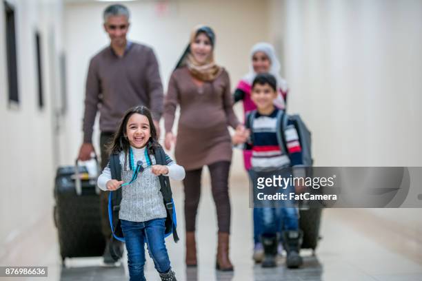 leading the family - emigration and immigration stock pictures, royalty-free photos & images