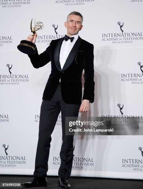 Steve Coogan poses with the award for Best Comedy for 'Alan Partridge's Scissored Isle' during 45th International Emmy Awards at New York Hilton on...