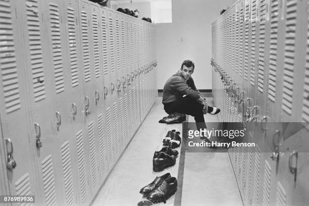 British golfer Anthony 'Tony' Jacklin sitting in a locker room, UK, 26th March 1968.