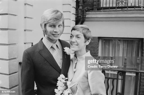 British actor Michael York with photographer Patricia McCallum on their wedding day at Kensington Registrar Office, London, UK, 27th March 1968.