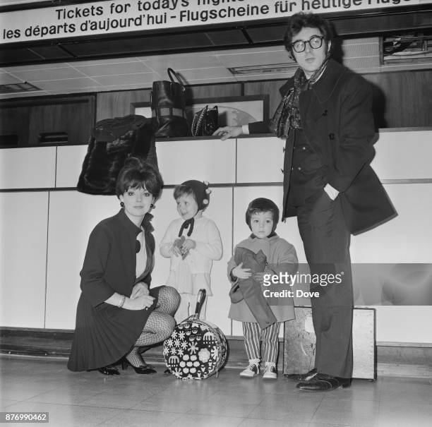 British actress and author Joan Collins with husband, actor and singer-songwriter Anthony Newley , and their two children, Tara and Sacha, at...