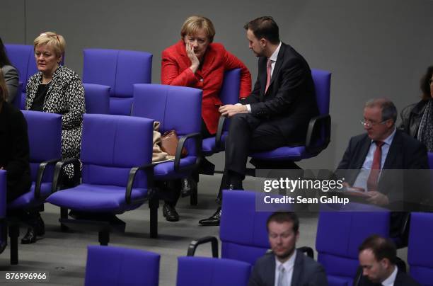 German Chancellor and leader of the German Christian Democrats Angela Merkel speaks with Paul Ziemiak, head of the Junge Union, the youth party of...