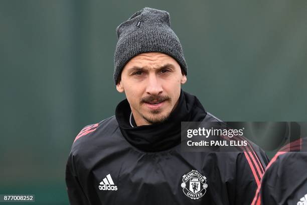 Manchester United's Swedish striker Zlatan Ibrahimovic attends a team training session at the club's training complex near Carrington, west of...