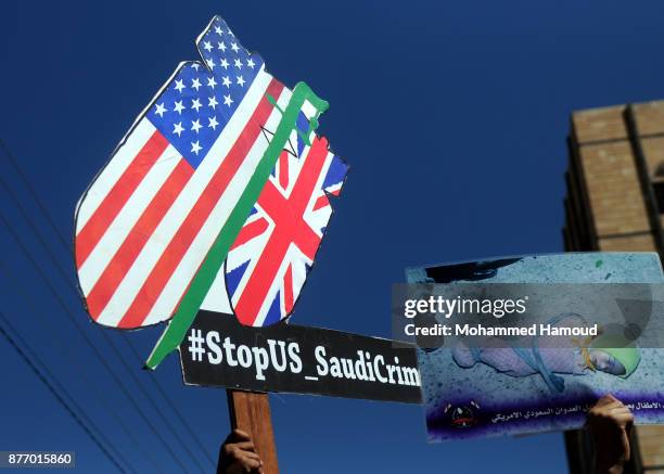 Yemeni children take part in a protest outside the United Nations Office on November 20, 2017 in Sana'a, Yemen. Protestors demand the UN and the...