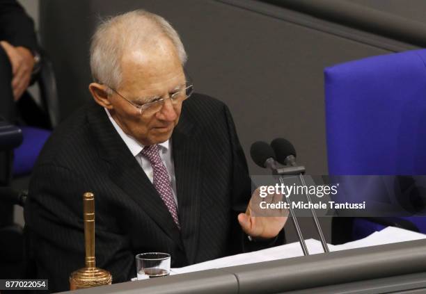 German parliament's President and former finance minister Wolfgang Schaeuble gestures as he speaks during the first session of the Bundestag, the...