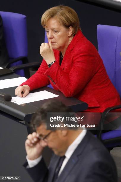 German Chancellor and leader of the German Christian Democrats Angela Merkel listens to Germany's Foreign minister Sigmar Gabriel during the first...