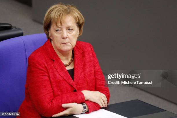 German Chancellor and leader of the German Christian Democrats Angela Merkel pauses during the first session of the Bundestag, the German parliament,...