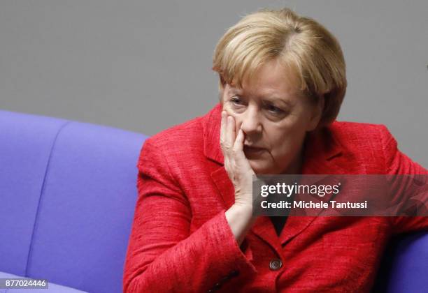 German Chancellor and leader of the German Christian Democrats Angela Merkel pauses during the first session of the Bundestag, the German parliament,...