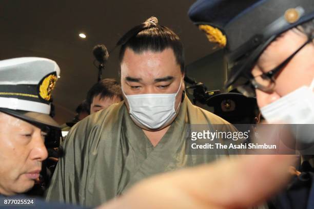 Mongolian yokozuna Harumafuji is seen on arrival at Fukuoka Airport during day ten of the Grand Sumo Kyushu Tournament at Fukuoka Convention Center...