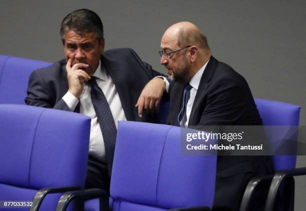 Sigmar Gabriel, Germany's foreign minister speaks with Martin Schulz, leader of the Social Democrats Party or during the first session of the...
