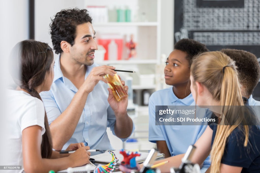 Interested middle school students in biology class