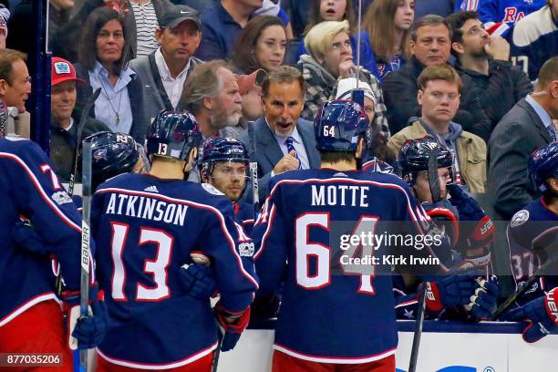 Head coach John Tortorella of the Columbus Blue Jackets talks with Tyler Motte of the Columbus Blue Jackets and Cam Atkinson of the Columbus Blue...