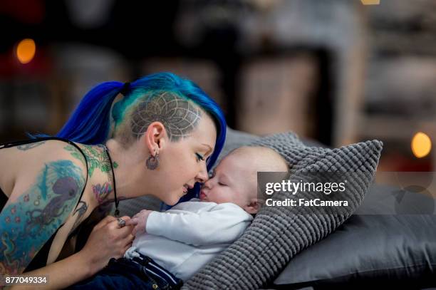 loving mother - septum stock pictures, royalty-free photos & images