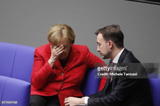 German Chancellor and leader of the German Christian Democrats Angela Merkel speaks with Paul Ziemiak, chairman of the young associacion of the CDU...