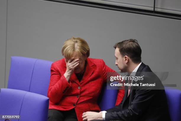 German Chancellor and leader of the German Christian Democrats Angela Merkel speaks with Paul Ziemiak, chairman of the young associacion of the CDU...