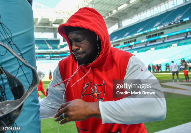 Gerald McCoy of the Tampa Bay Buccaneers warms up before the game against the Miami Dolphins at Hard Rock Stadium on November 19, 2017 in Miami...