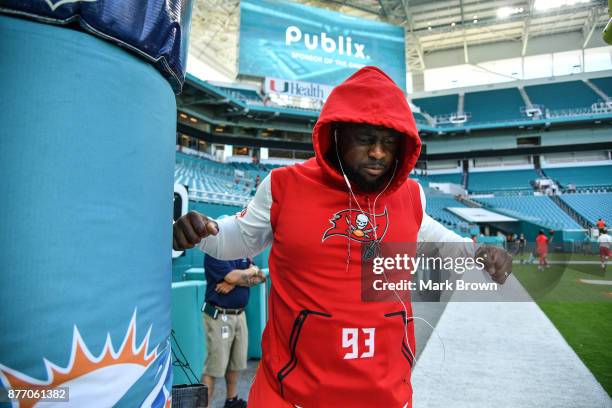 Gerald McCoy of the Tampa Bay Buccaneers warms up before the game against the Miami Dolphins at Hard Rock Stadium on November 19, 2017 in Miami...