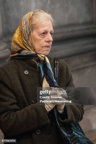 Woman prays at Madonna della Salute church on the day of the traditional Festa della Salute on November 21, 2017 in Venice, Italy. The Festa della...