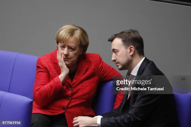German Chancellor and leader of the German Christian Democrats Angela Merkel speaks with Paul Ziemiak, chairman of the young associacion of the CDU...